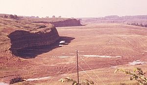 EPA Documerica photo showing some reclamation near New Athens, Ohio, 1973-74, but with remaining highwalls.