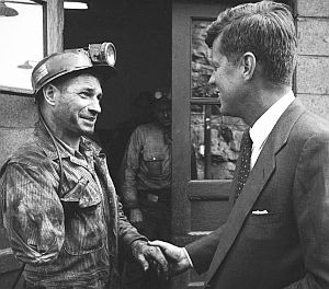 April 1960: JFK greets  a one-armed miner near Mullens, WV while on the campaign trail for the West Virginia primary election. Photo: Hank Walker, Time/Life.