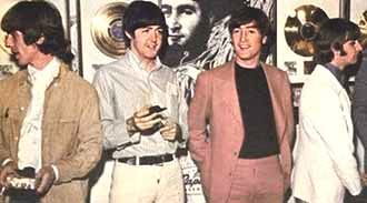 August 24th, 1966: Beatles at the Capitol Records Tower Building in Los Angeles, for press conference and to receive Gold Record award.