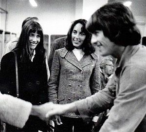Aug 29th, 1966: Joan Baez, center, with sister Mimi Farina, backstage at Candlestick Park; George Harrison in foreground. Baez also brought along 10 year-old neighbor, Naomi Marcus, to meet the Beatles.
