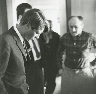 Robert F. Kennedy, listening to a miner relay his concerns during a two-day tour in Neon, KY, February 1968.