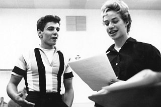 1959: Carole King and singer Johnny Restivo between takes in New York recording studio.