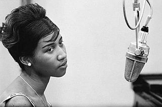 Aretha Franklin in recording studio, 1960s. Click for hits link.