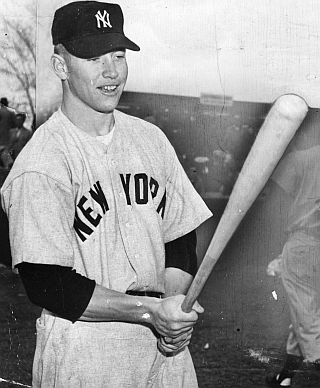 March 1951: Young Mickey Mantle picking out a bat at New York Yankee spring training.
