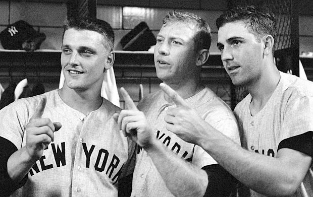 October 12th, 1960, Forbes Field, Pittsburgh, PA.  New York Yankees Roger Maris, Mickey Mantle, and Clete Boyer are optimistic about their chances in winning the 1960 World Series against the Pittsburgh Pirates, having just thrashed the Pirates in Game 6 by a 12-0 score. "1 more" is all they need, say the boys, but it was not to be, as the Pirates pulled off one of the most exciting World Series finishes in baseball history. Click for separate story.