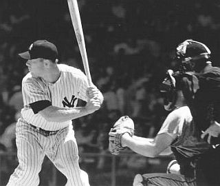 1961: Mickey Mantle, coiled up and waiting to strike.