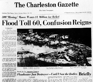 The Charleston Gazette of February 1972 reporting on the early flood death total, with front-page photo of damaged homes thrown about on the valley floor.