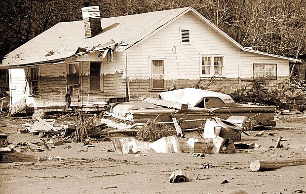 February 1972. Some of the flood damage in the aftermath of the Buffalo Creek disaster in West Virginia, showing "mud line" on damaged home, indicating approximation of flood levels for some structures, while others were carried away in the wave or disintegrated into pieces.