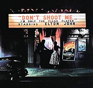 January 1973. 6th studio album, “Don’t Shoot Me, I’m Only the Piano Player” released. Click for CD.