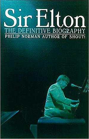 Philip Norman’s 2001 book, “Sir Elton: The Definitive Biography,” 592 pp,  Carroll & Graf, publisher. Click for copy.