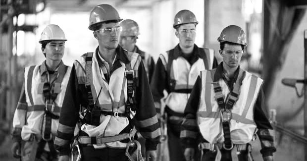 Stock photo of construction workers.  In the aftermath of the 1989 Phillips plastic plant explosion, an examination of the differences in experience and training between long-time company and union employees vs. hired-out contract workers was revealed to be an important issue, with contract workers’ inexperience implicated in the explosion. 