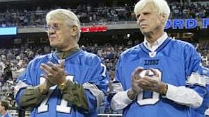 Sept 2003: Alex Karras and George Plimpton at 40th “Paper Lion” reunion at Ford Field in Detroit. Karras, featured in “Mad Ducks & Bears,” became lifelong Plimpton friend.