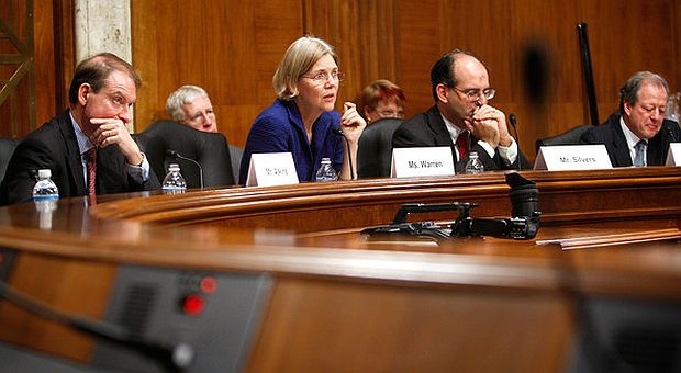 Dec 10, 2009. Congressional Oversight Panel at Capitol Hill hearing,  (L-R) Paul Atkins, Chair, Elizabeth Warren, Damon Silvers, and Richard Neiman, evaluating whether TARP was helping nation’s financial situation. Photo, Alex Wong.