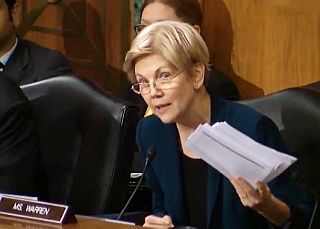 September 2016. Senator Warren during questioning of Wells Fargo CEO John Stumpf, with documentation in hand, Click for C-SPANN video.