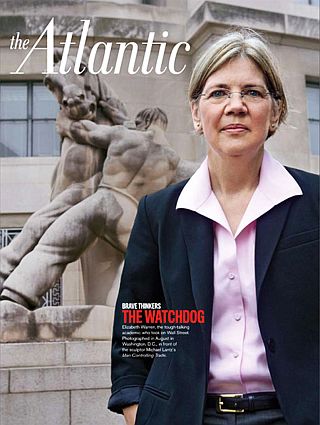 Elizabeth Warren featured in an Atlantic magazine story as she rose in Washington policy circles, here photographed in front of the D.C. sculpture, “Man Controlling Trade.” 