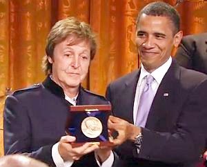 2010. Paul McCartney collecting his Gershwin Prize for popular music from President Obama at the White House.