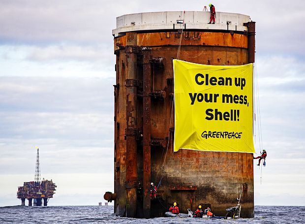 October 2019. Greenpeace activists from the Netherlands, Germany and Denmark boarded two oil platforms in Shell's Brent field in protest against plans by the company to leave parts of old oil structures with 11,000 tons of oil in the North Sea. Climbers, supported by the Greenpeace ship Rainbow Warrior, scaled Brent Alpha and Bravo and hung banners saying, `Shell, clean up your mess!' and `Stop Ocean Pollution'.  Source: Greenpeace 