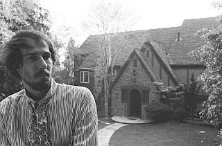 1960s. John Phillips in front of the home in Bel Air that he and Michelle shared, and where John would install a recording studio.