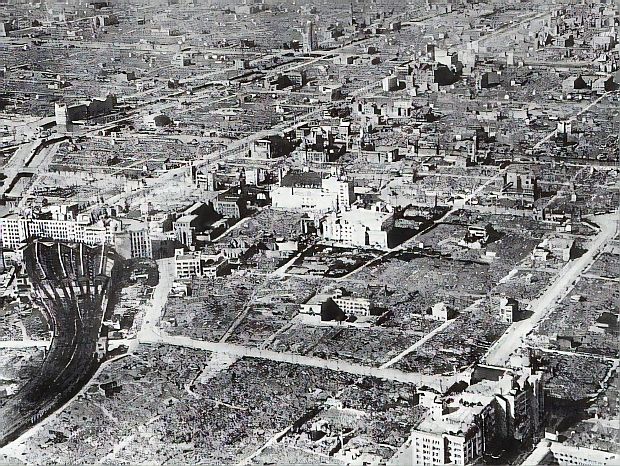 This photo shows damage in the Namba area of Osaka following 1945 U.S. bomber raids. The Nankai Namba rail station is visible at left.
