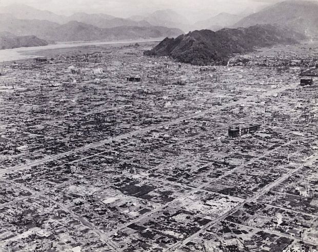Photo of Shizuoka, Japan, sometime after being firebombed on June 19, 1945 by 137 B-29 bombers  which attacked in two waves from east and west, so as to trap the population within the center of the city, between the mountains and the sea, dropping 13,211 incendiary bombs. The resultant firestorm destroyed most of the city (66.1%), then with an estimated  population of 212,000, comparable in size to Oklahoma City, OK. Two B-29s collided mid-air during the operation, resulting in the deaths of 23 Americans. See: “Bombing of Shizuoka in World War II,” Wikipedia.
