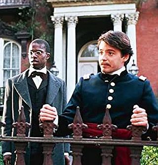 The young Colonel Robert Shaw (Broderick) at right, in Boston, along with Thomas Searles (Braugher), his boyhood friend, who becomes the 54th’s first volunteer at word of the unit’s forming.