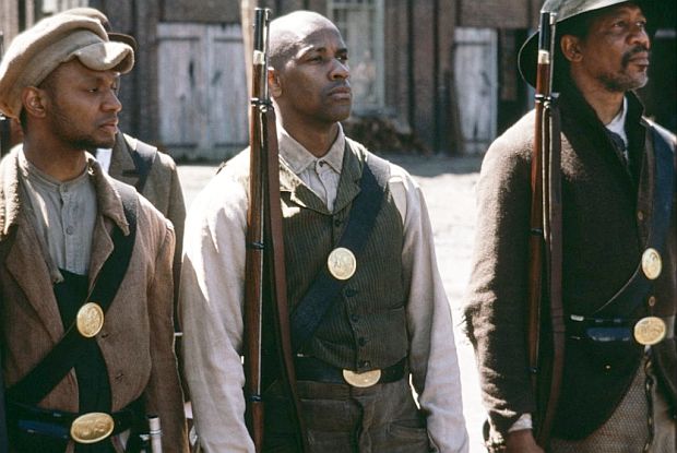 A few of the volunteer recruits  for the 54th during training. From left: Pvt. Jupiter Sharts (Jihmi Kennedy); Pvt Silas Trip (Denzel Washington), and Sgt, Major John Rawlins (Morgan Freeman) who becomes a troop leader. 