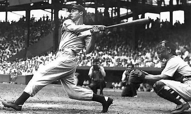 Joe DiMaggio of the New York Yankees, shown here during his prime playing years, exhibiting one of the most productive and near-perfect batting swings in baseball history.