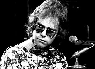 Early 1970s photo of Elton John at piano by Chris Walter.