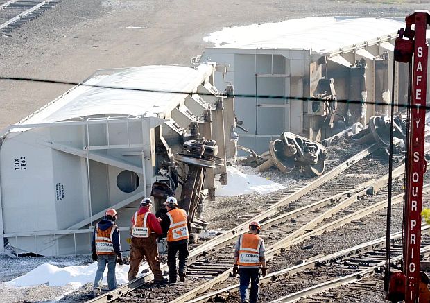 April 25th, 2013. Derailment at Wheeling & Lake Erie Railroad’s Gambrinus Yard in Canton, Ohio. caused three hopper rail cars to spill plastic pellets in a train yard. Photo shows two of the cars on their side with visible spills of white pellets. 