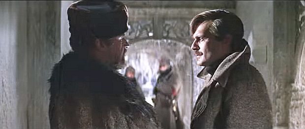 Komarovsky finds Lara and Zhivago at Varykino and offers them passage on his train East, but they resist, at which point Komarovsky takes Zhivago aside to detail the dangers that Lara & Katya now face if they stay.