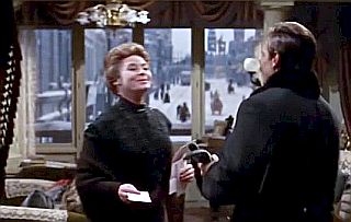 Yuri Zhivago, entering the Moscow town home of the Gromekos where he grew up, meeting Anna Gromeko, who has mail for him.
