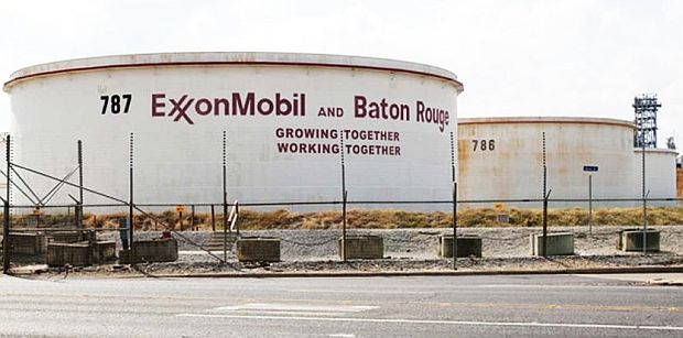 2014. Large storage tank at Baton Rouge refinery with painted message: “ExxonMobil and Baton Rouge - Growing Together, Working Together.” Photo, Monique Verdin, Louisiana Weekly / Louisiana Bucket Brigade.